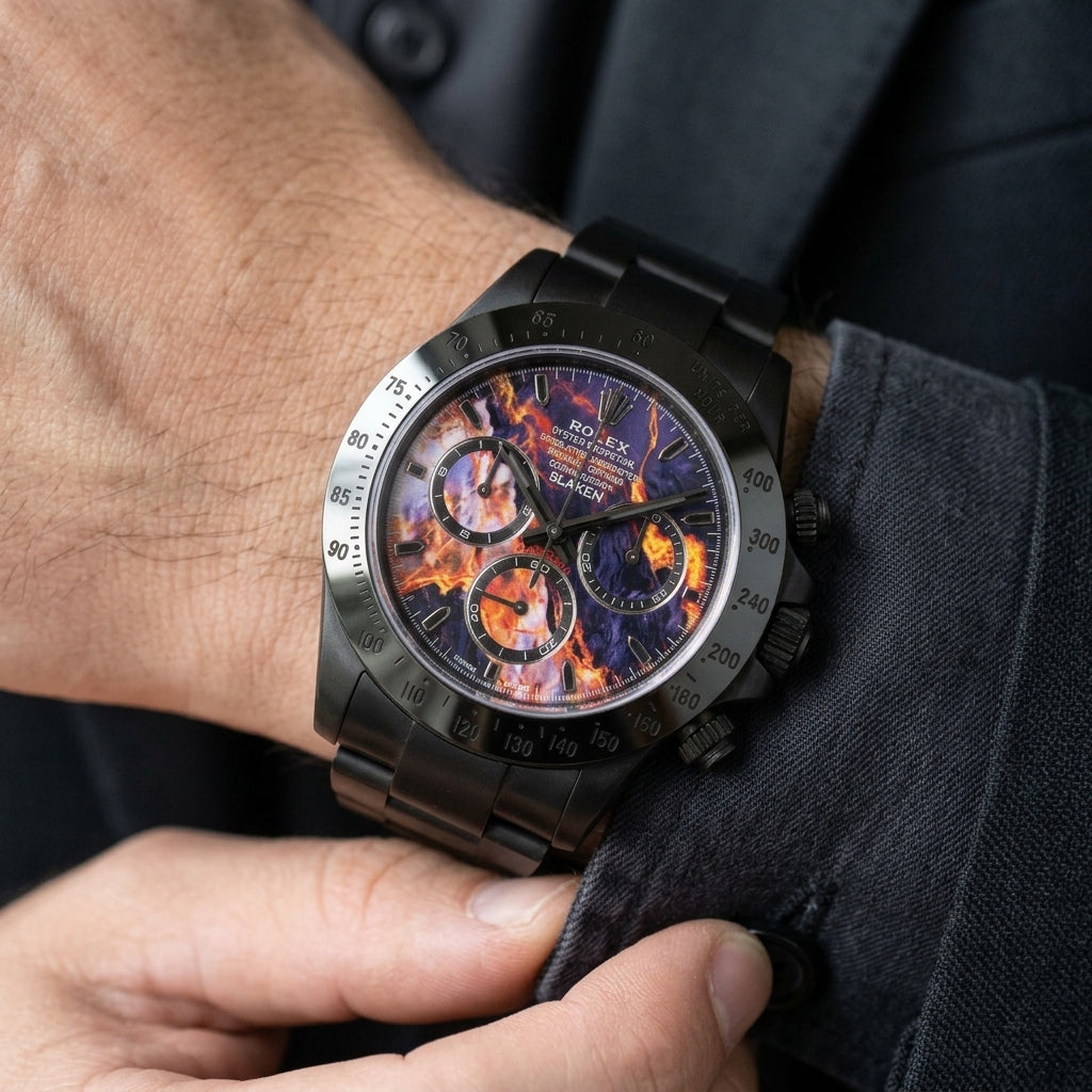 Black DLC chronograph with a violet lava dial on the wrist as a shirt cuff is fastened