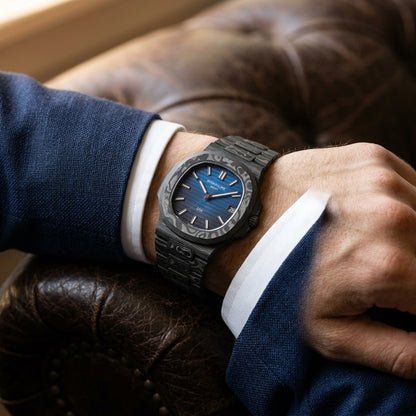 Carbon Sports Watch — Blue Gradient Dial — worn on the wrist under a tailored cuff