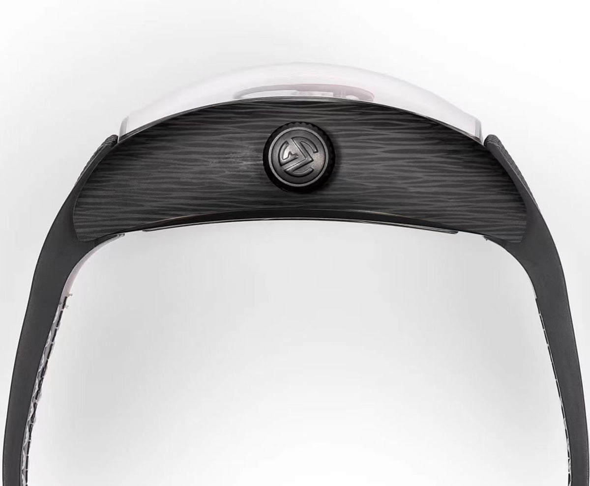 Studio photograph of the Open Tourbillon on black granite