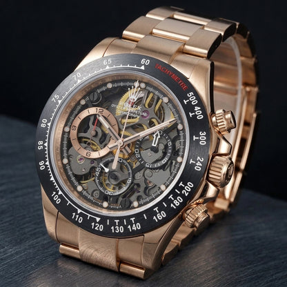 Rose gold skeleton chronograph at a three-quarter angle, the fluted crown and pushers beside the brushed black bezel