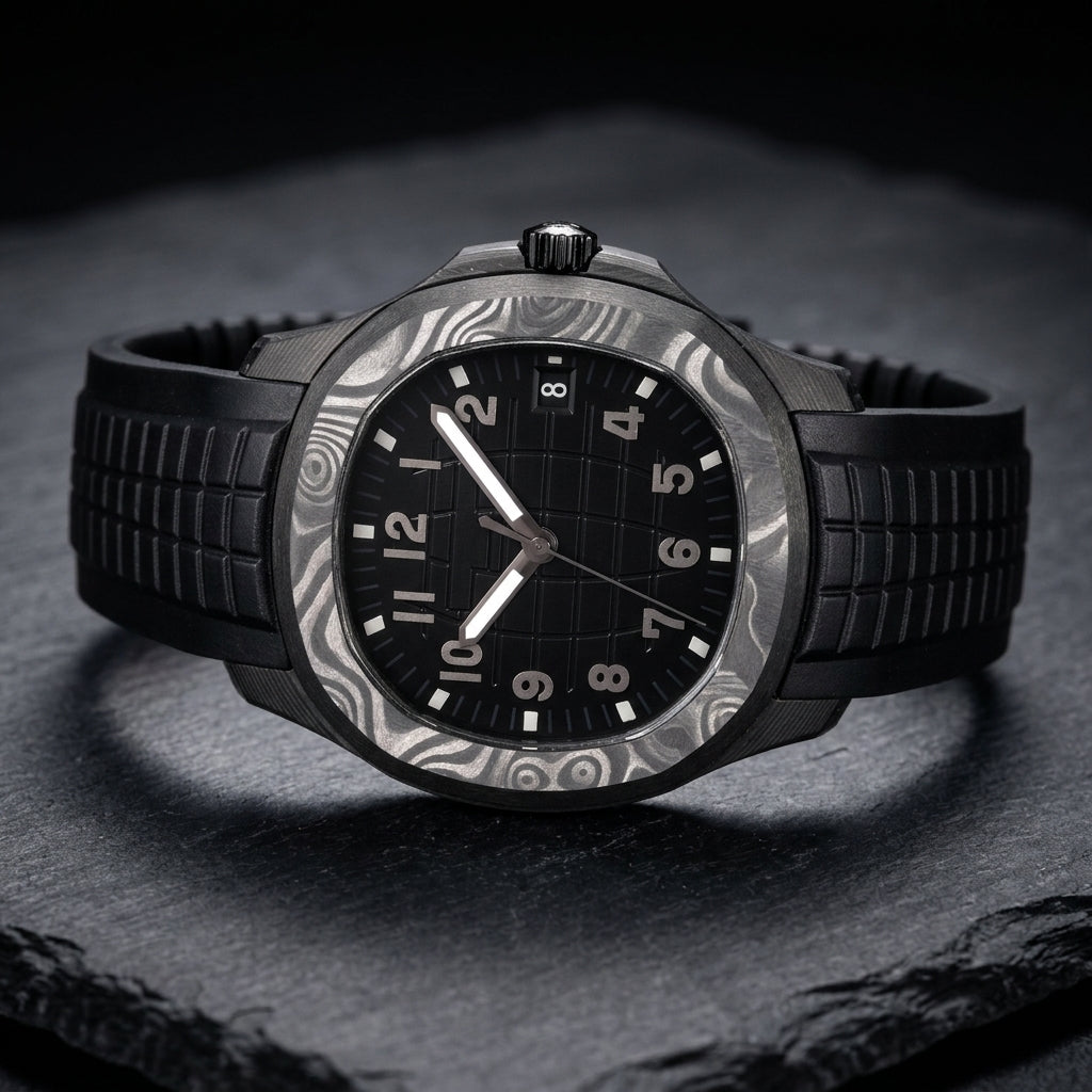 Forged-carbon watch at a three-quarter angle on dark slate, the swirled grey bezel beside the black fluted crown