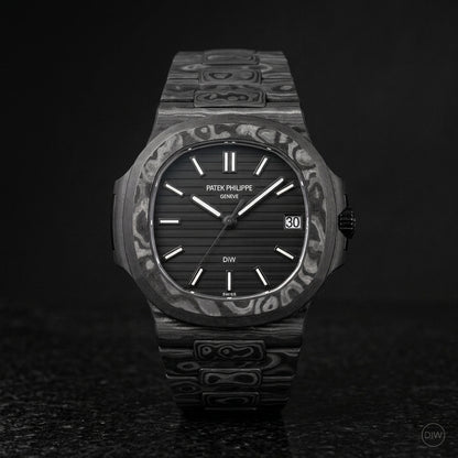 All black carbon sports watch on black granite