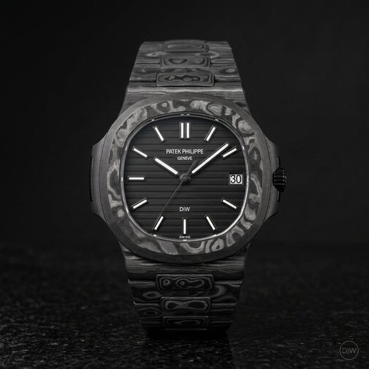 All black carbon sports watch on black granite