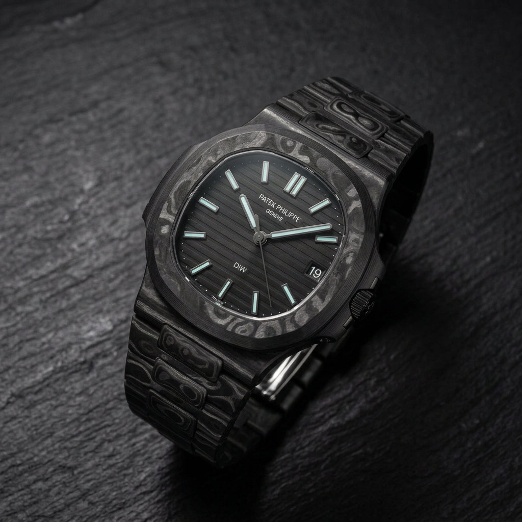 All black carbon sports watch at a three-quarter angle on dark slate