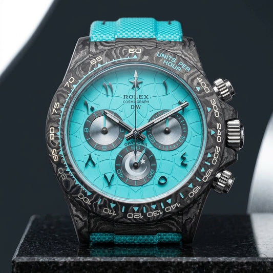 Forged-carbon chronograph with a turquoise crackle dial on black granite