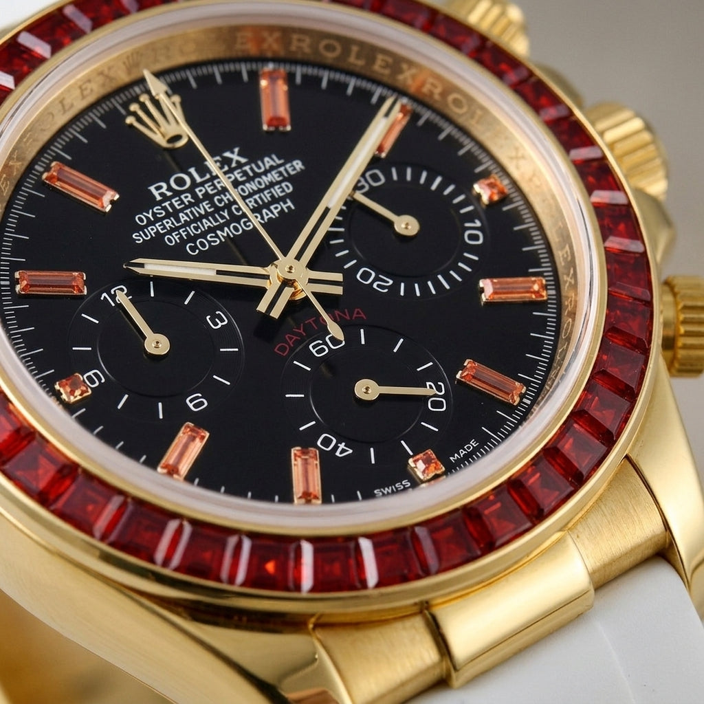 Macro of the black dial, its orange stone markers and white-printed black counters, framed by thirty-six red baguette-cut stones