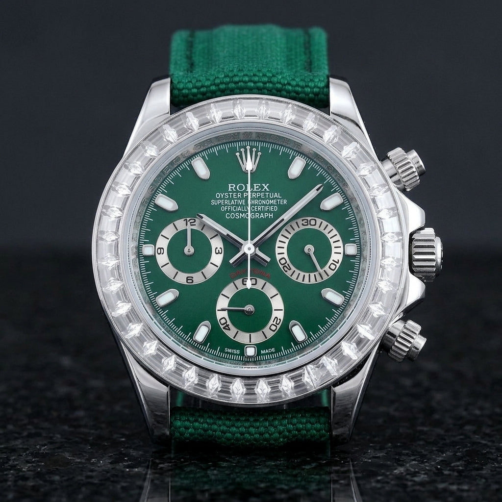 Steel chronograph with a deep green dial and a bezel of clear baguette-cut stones, upright on polished black granite