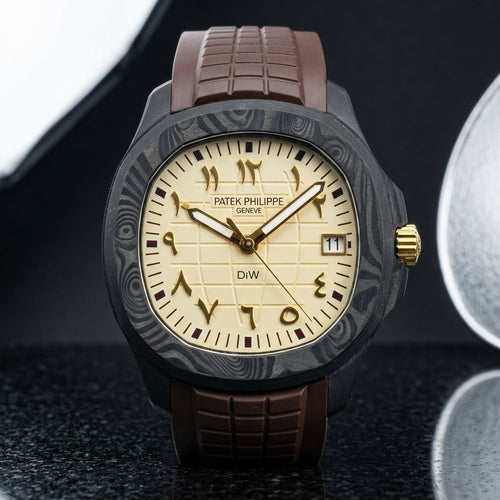 Black forged-carbon grid-dial watch with a cream dial, gold Eastern Arabic numerals and a gold crown, upright on polished black granite