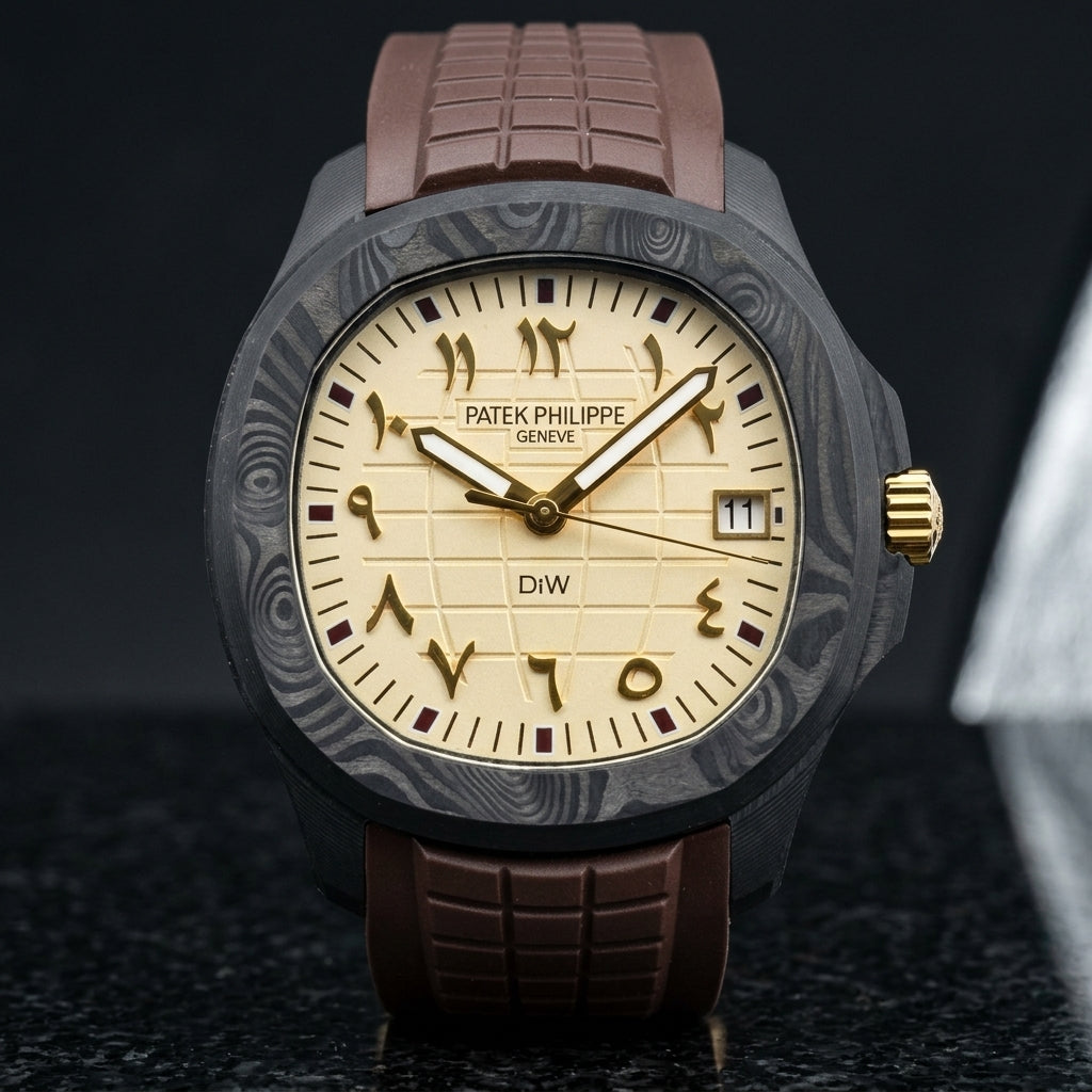 Black forged-carbon watch with a cream dial on a chocolate-brown rubber strap, worn on the wrist below a navy suit cuff
