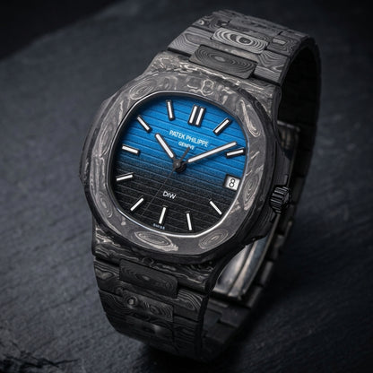 Forged carbon sports watch at a three-quarter angle on dark slate, the rounded-octagon bezel veined in silver-grey beside the black crown