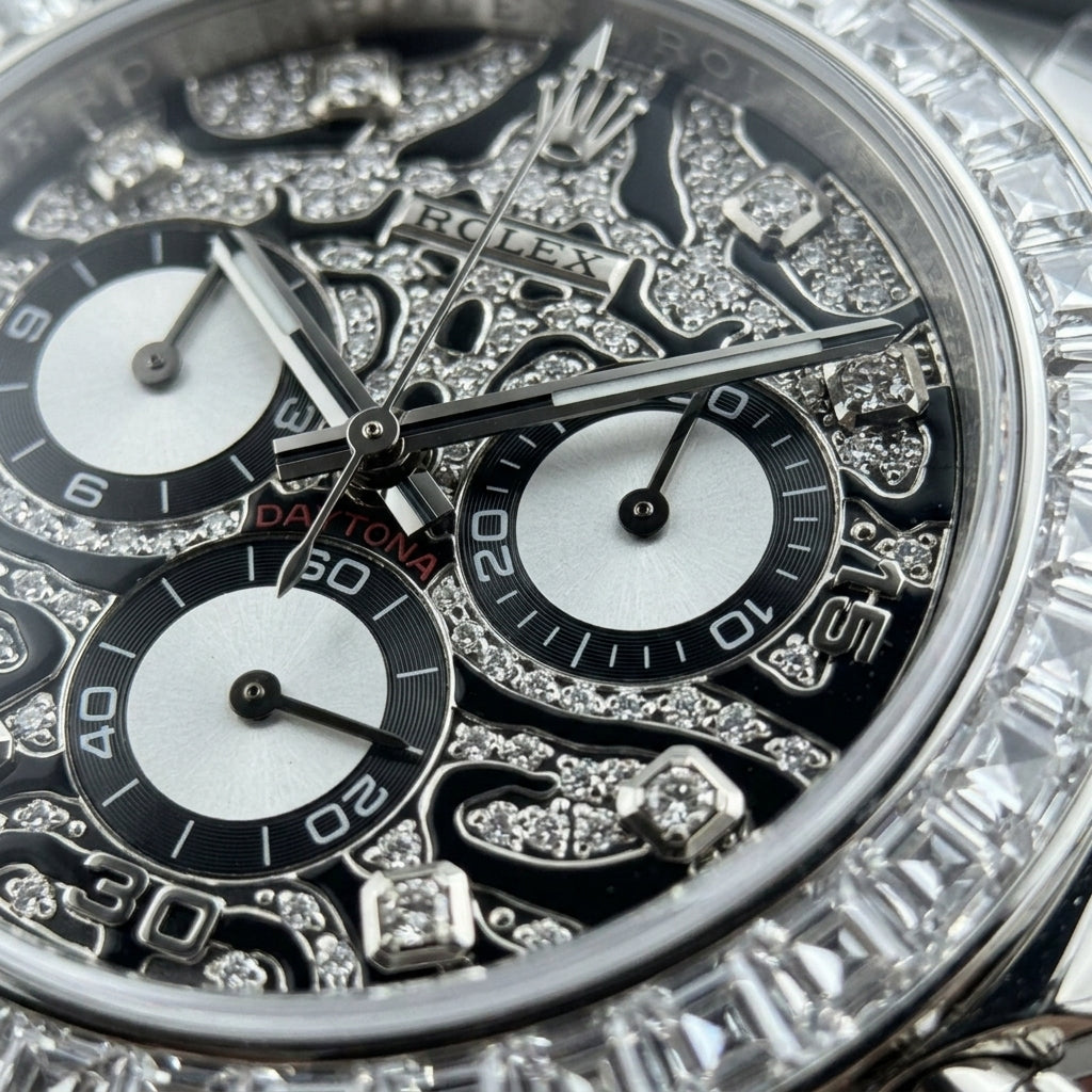 Macro of the black leopard pavé dial with steel-outlined patches, stone hour markers and silver-white counters