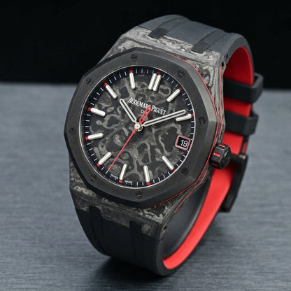 Forged carbon octagonal watch at a three-quarter angle on dark slate